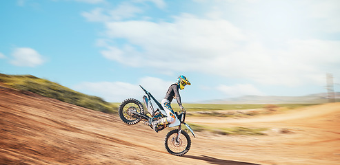 Image showing Motorcross, offroad speed and sports on sky for freedom, action or fearless driving. Driver, cycling and power on dirt track, motorcycle competition and motorbike performance on fast adventure course