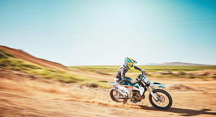 Image showing Motorbike, motorsports and speed on dunes with power, sky mockup and offroad path. Driver, motorcycle and travel on dirt track, sand and adventure course for fast action, freedom or rally performance