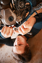 Image showing Hands, mechanic and engine gears in motor repairs with tools for bolts, safety or mechanical parts. Hand of engineer fixing motorbike, transport or transmission on automobile or vehicle in workshop