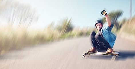 Image showing Skateboard, motion blur or mockup with a sports man skating at speed on an asphalt street outdoor for recreation. Skate, soft focus and fast with a male athlete or skater training outside on the road