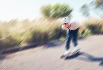 Image showing Motion blur, skateboard or mock up and a sports man outdoor on an asphalt street at speed with balance. Skating, fast and mockup with a male skater on a road for fun, freedom or training outside