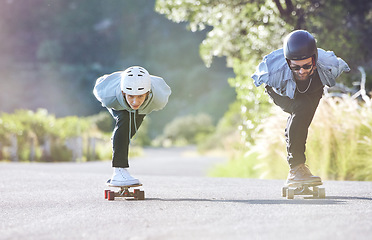 Image showing Friends, speed and longboard skating in road, racing downhill with skateboard and helmet for safety. Extreme sports adventure, skateboarding street race and skateboarder ride on mountain pass.