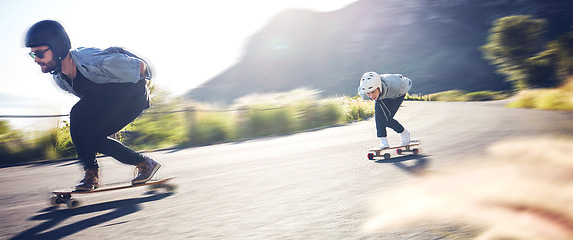 Image showing Sports, speed and fast longboard skating in road, friends racing downhill with skateboard and helmet for safety. Extreme sport adventure, skateboarding street race and skateboarder on mountain pass.