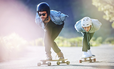 Image showing Sports, speed and safety, longboard skating in road, friends racing downhill with skateboard and helmet. Extreme sport adventure, skateboarding street race and skateboarder riding on mountain pass.