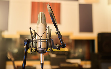 Image showing Music, media and rock with microphone in studio for recording, performance and audio. Radio, technology and sound with electronics equipment in empty room for broadcast, singing and entertainment