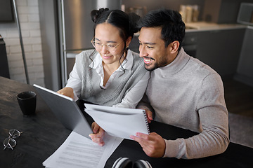 Image showing Finance, budget and asian couple on tablet at home working on mortgage documents, financial feedback or loan. Happy, smile or people on tech for internet banking, accounting review or audit research