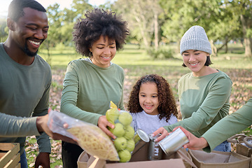 Image showing Volunteering, donation food and people with child for sustainability, poverty help and community service in park. Support, teamwork and fruits, vegetable and box for homeless, charity or society care