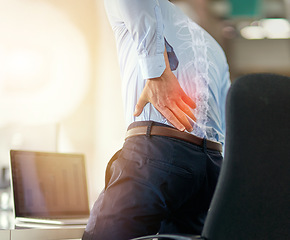 Image showing Businessman, back pain and x ray of spine from sitting and working by laptop on desk chair at the office. Employee male suffering spinal injury or slip disk with ache, inflammation or painful join