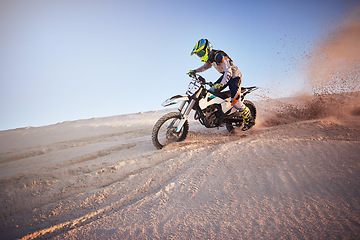 Image showing Moto cross, Dubai desert or man on bike stop for sport workout, sunset ride or exercise on hill. Nature, sky or person on motorcycle freedom adventure in sand for training, fitness or race sports