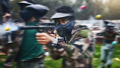 Image showing Paintball gun, shooting and men in camouflage with safety gear at military game for target practice. Teamwork, sports training and war games, play with rifle and friends working together at army park