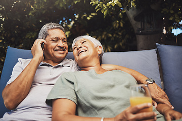 Image showing Phone call, outdoor and senior couple relaxing together while on a summer vacation or weekend trip. Happy, love and elderly man and woman resting while on a mobile conversation on retirement holiday.