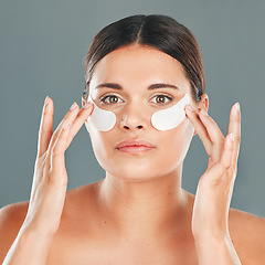 Image showing Beauty, eye patch and portrait of woman face, skincare and dermatology on studio background. Female model, facial and eye care gel for dark circles, body cosmetics and wellness of collagen treatment