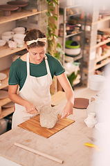 Image showing Pottery, creative and small business with a woman designer working in her studio for art from above. Manufacturing, startup and scupture with a female entrepreneur, employee or artist in a workshop