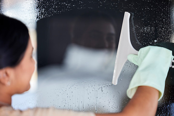 Image showing Woman cleaning window, cleaner and chemical for hygiene, surface disinfection and protection from bacteria. Housework, clean service and housekeeper with hospitality, janitor and water drops on glass