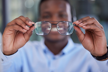 Image showing Businessman, cleaning glasses and office for healthy vision, smile or happy for clear eyesight. Black man, hands or fashion spectacles for african corporate worker with excited happiness at workplace