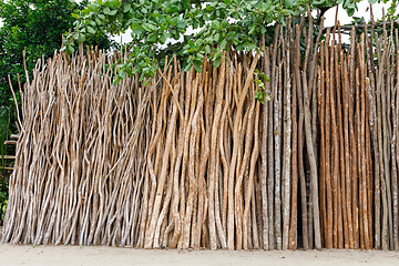 Image showing wooden poles for home construction in Madagascar