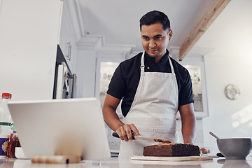 Image showing Man, tablet and baking cake recipe in kitchen for birthday party or celebration. Young chef, reading cooking website and bake dessert product on counter for wellness on digital tech device