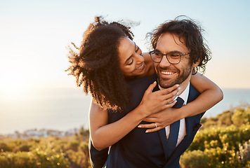 Image showing Bride, groom and piggyback hug at wedding in nature, happy and smile while celebrating love, beginning and relationship. Marriage, interracial couple and black woman and man embrace outdoor with fun