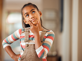 Image showing Confused, thinking and idea with face of girl for question, solution and wondering. Doubt, knowledge and learning with puzzled child in concentration for thoughtful, imagine and uncertain at home