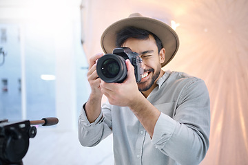 Image showing Photographer, camera and man in studio for photoshoot, creative and happy on space, mockup and background. Magazine, photography and backstage shooting professional male having fun session in Japan