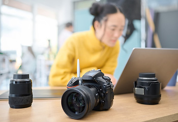 Image showing Photography camera, laptop and woman editing photoshoot, focus on digital art or retouching artistic photo. Graphic tablet, creative vision and professional photographer working on creativity process