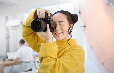 Image showing Photography, camera and photographer in studio shooting creative memory picture, Japanese photoshoot or digital production. Lens focus, art creativity and young Asian woman working for artistic shot