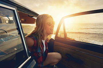 Image showing Woman, sunset and beach road trip by car door with smile, freedom and happiness for summer vacation. Happy gen z girl, suv and sunglasses for sunshine, outdoor adventure or holiday by waves on travel