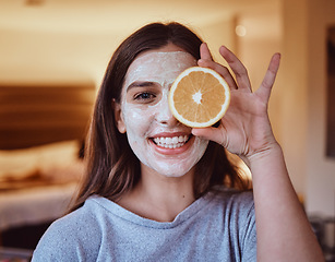 Image showing Skincare, orange and portrait of woman in her home for wellness, grooming and mask, treatment and facial. Fruit, face and girl relax with citrus product, natural and skin detox routine in her home