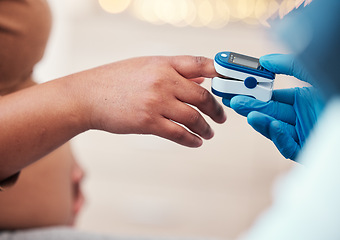 Image showing Pregnant woman, hands and diabetes test with nurse in home to check blood sugar levels. Diabetic healthcare, pregnancy and hand of female with glucometer machine to measure glucose for prenatal care.