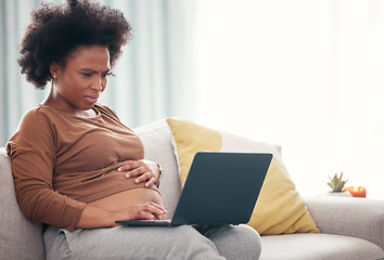 Image showing Pregnancy, laptop and black woman on a sofa working from home on a freelance business project. Confused, computer and African pregnant female freelancer planning report while relaxing in living room.