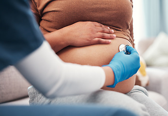 Image showing Closeup, pregnant and woman with healthcare checkup and stomach with wellness, appointment and results. Zoom, pregnancy and female with doctor, stethoscope and medical professional for consultation