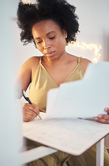 Image showing Planning, paperwork and black woman writing a budget, working on tax and home accounting. Finance, loan and African girl with documents for payment, contract and entrepreneurship business investment