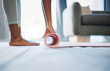 Image showing Fitness, yoga and woman rolling mat for meditation, balance and workout for wellness, health and exercise. Female, lady and start pilates training, practice or stretching for peace or relax in lounge