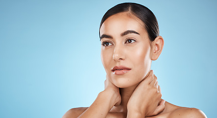 Image showing Beauty woman isolated on studio background for skincare, cosmetics or makeup with mockup space. Thinking, idea and inspiration of model or person aesthetic, dermatology or facial glow on blue mock up