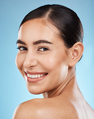 Image showing Face, back skincare and beauty of woman in studio isolated on a blue background. Portrait, makeup and cosmetics of female model with healthy, glowing and flawless skin after spa facial treatment.