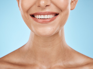 Image showing Closeup, mouth and woman with skincare, cosmetics and dermatology with girl on blue studio background. Face, female and lady with clean teeth, natural beauty and grooming routine for fresh breath