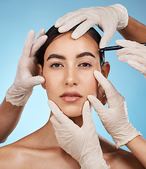 Image showing Beauty portrait, woman and plastic surgery hands, isolated on studio background for medical facial and aesthetic. Doctors, medical people for reconstruction or lines with pen on model or person face