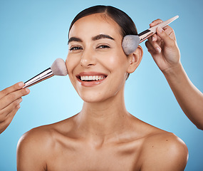 Image showing Face portrait, hands and makeup brush of woman in studio isolated on blue background. Aesthetics, facial cosmetics or skincare of happy female model with brushes for foundation, powder or dermatology