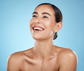 Image showing Face, thinking and beauty skincare of woman in studio isolated on a blue background. Aesthetics, makeup and cosmetics of female model with healthy, glowing or flawless skin after spa facial treatment