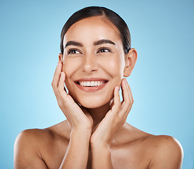 Image showing Thinking, face and beauty skincare of woman in studio isolated on a blue background. Aesthetics, makeup or cosmetics of female model with healthy, glowing and flawless skin after spa facial treatment