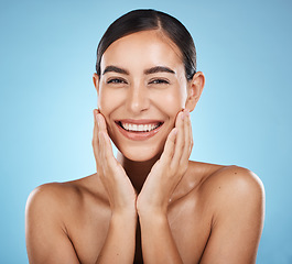 Image showing Portrait, face and beauty skincare of woman in studio isolated on a blue background. Aesthetics, makeup or cosmetics of female model with healthy, glowing and flawless skin after spa facial treatment