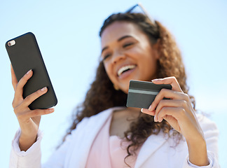 Image showing Woman, hands and phone with credit card for ecommerce, online shopping or bank for purchase outside. Happy female with smile for 5G connection, banking app or buying on mobile smartphone with debit