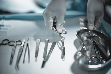 Image showing Operation, doctor and medical instruments for surgery in a ER or operating room in the hospital. Emergency, steel appliances and nurse prepare tools for a surgeon for healthcare in surgical theatre.