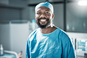 Image showing Face portrait, black man and doctor in hospital satisfied with career, job and clinic profession. Healthcare, medical professional and confident, proud and happy male surgeon from Nigeria in scrubs.