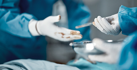 Image showing Surgery, hospital and hands of doctors with tweezers in operating room for emergency operation on patient. Health clinic, teamwork and medical surgeons working with surgical tools to save a life.