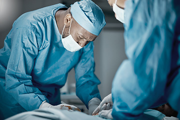 Image showing Surgery, hospital and healthcare doctors in operating room for emergency operation on patient. Health, collaboration and team of medical surgeons working with surgical tools to save a life in clinic.