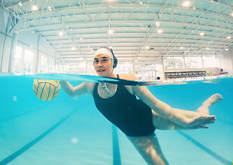 Image showing Water polo, sports and girl in swimming pool surface for game, competition and practice for match. Professional sport, fitness and young woman athlete with ball for training, exercise and workout