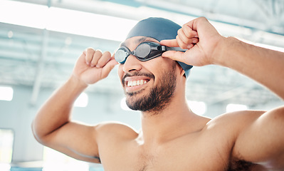 Image showing Swimming athlete, happy man and start race, fitness and exercise at pool, motivation and active lifestyle. Water sports, smile on face and workout, training for health and wellness with sport goggles