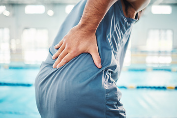 Image showing Pain in back, sports and man by swimming pool with injury, muscle ache and inflammation from training. Health, medical care and male with accident, emergency or body bruise from fitness or exercise