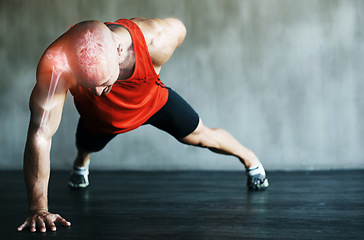 Image showing Fitness, push up and bodybuilder man in strong, power training or exercise in gym and muscle x ray overlay. Health, sports and athlete person with shoulder or arm workout on ground on wall background